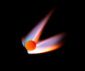 a burning meteorite with a tail of flames.