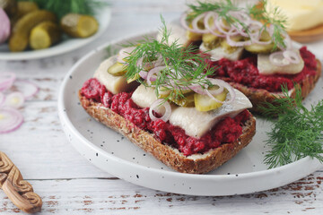 Scandinavian sandwiches with herring and beetroot	
