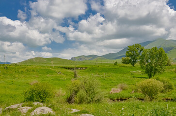 Obraz premium farmlands and Lesser Caucasus mountains around Bovadzor village (Lori province, Armenia)