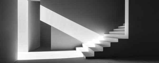 Obraz premium Sunlit modern interior stairs ascend; light streams through an upper level opening