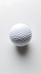 7. A golf ball on a white background with smooth texture