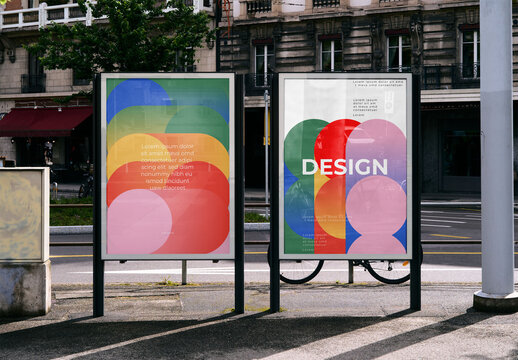 Mockup Of Two Vertical Customizable Posters In City