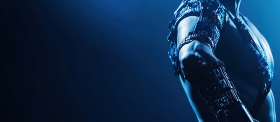 Blue-lit dancer's arm, stage performance, dark background, concert poster