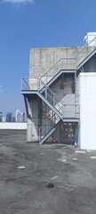 open space on building rooftop with blue sky background