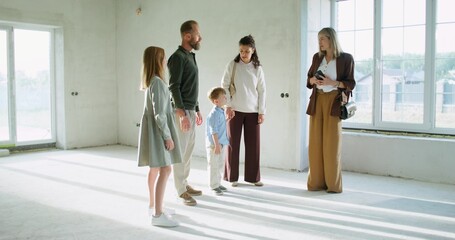 The realtor shows the house without finishing to the buyers. House inspection before purchase