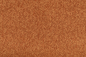 Texture of dense brown fabric for tailoring. Canvas. Textile. Material