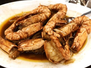 A serving of fried butter shrimp seasoned with garlic and other spices