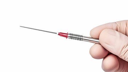 Gloved hand holding medical needle; white background; sterile procedure