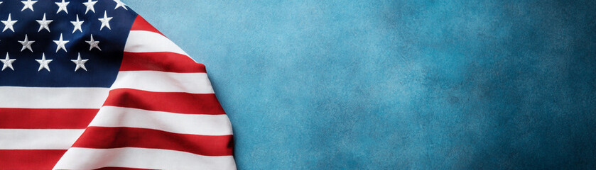 Fototapeta premium A close-up of the American flag against a blue background.