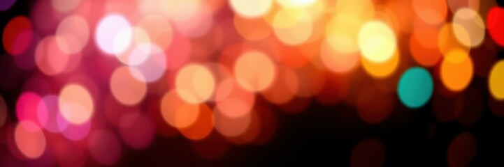 Colorful bokeh lights create a vibrant atmosphere during a festive night celebration in an urban setting