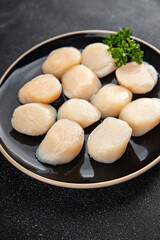 Sea scallop raw seafood fresh tasty food dish gourmet food background on the table rustic food top view copy space food pescetarian diet