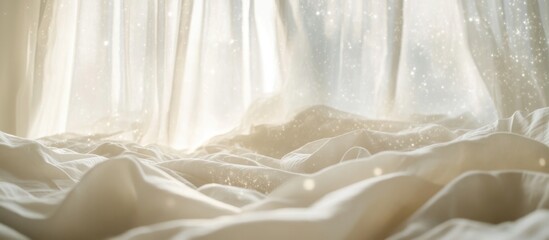 Obraz premium Sunlight Filtering Through Sheer Curtains onto Unmade Bed with Gentle Fabric Folds