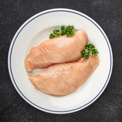 Chicken breast raw meat of the bird fresh tasty food dish gourmet food background on the table rustic food top view copy space keto and paleo diet
