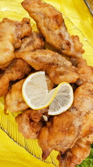 Fish fillet in batter on the festive table