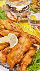 Fish fillet in batter on the festive table