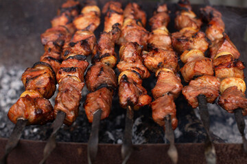 Juicy barbecue is grilled on a summer afternoon
