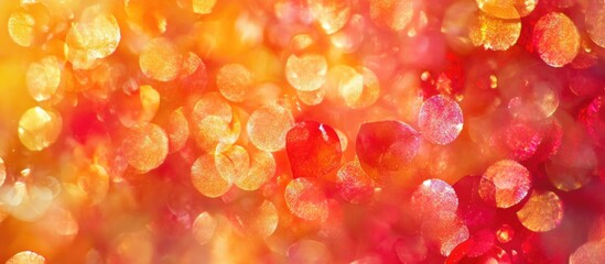 Colorful bokeh background with orange and red tones creating a warm abstract design suitable for various applications Copy Space