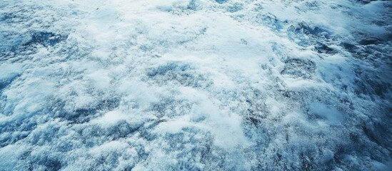Obraz premium Texture of frozen snow surface with intricate patterns and soft undulations Copy Space