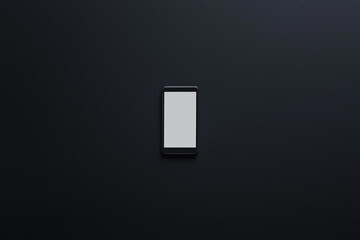 Phone on black surface, screen off