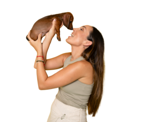 Cute young woman kisses and hugs her puppy dachshund dog. Love between owner and dog. Isolated on transparent background. PNG transparent.
