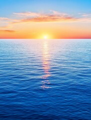 Fototapeta premium Serene Sunset Sea - Tranquil ocean scene, sunset colors, peaceful atmosphere, golden hour, water reflection.