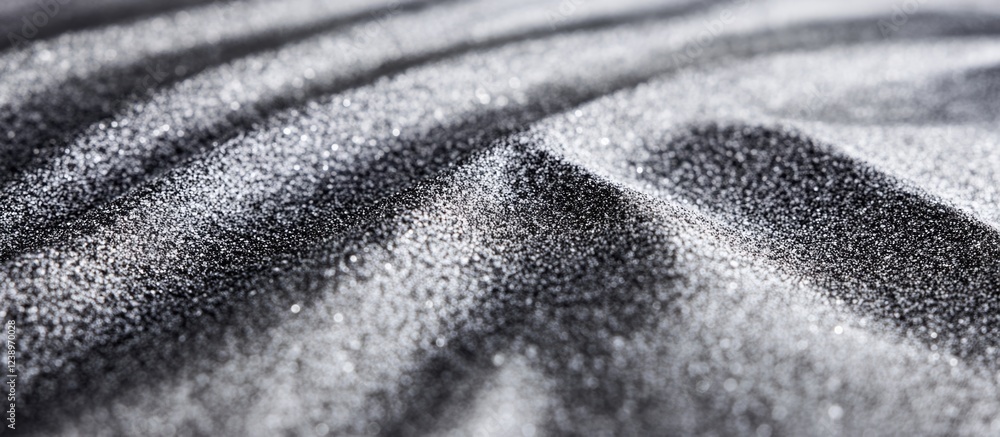 Poster Detailed close-up view of textured black sand with rippled patterns and sparkling granules Copy Space