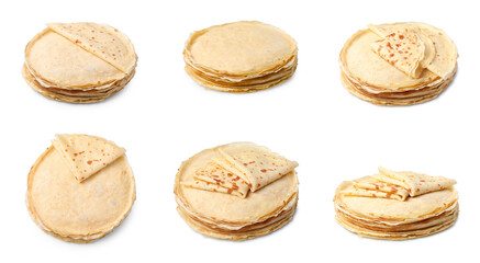 Set of delicious thin crepes on white background