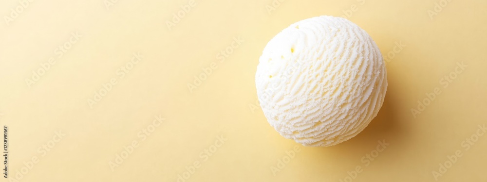 Poster white spherical dessert on yellow background with smooth texture and fine details isolated with ampl