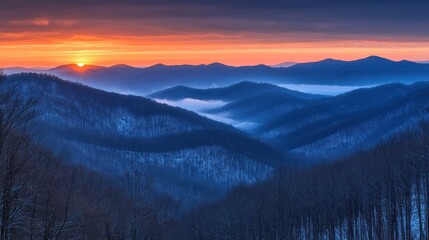 Obraz premium Sunrise Over Snowy Mountain Ranges Winter Landscape