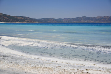 Turquoise Lake with white clay and mountains