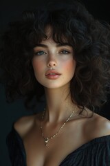 Glamorous portrait of a beautiful smiling woman with voluminous curly hair wearing gold jewelry in a leopard print dress against a vintage fabric background