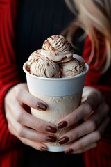 fresh ice cream scoops. Female, woman, holding an assortment of fresh ice cream cone her hand. Vanilla ice cream.