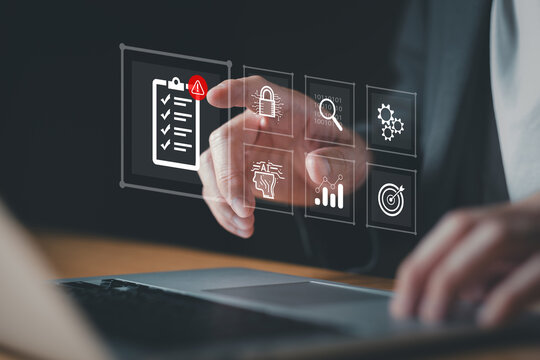 close up with hand of business person identify danger risk with AI among normal incident. Risk management concept for business and personal planning for risk mitigation with information and decision