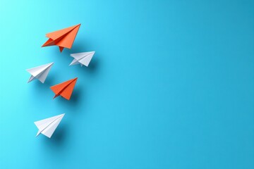 Creative Individuality in Business Concept with Minimalist Paper Airplanes Soaring in Different Directions