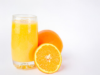 glass of orange juice on a white background