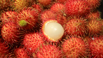 A pile of red rambutan fruit, Indonesian food