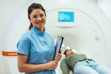Medical Professional Assisting Patient During MRI Scan in Modern Imaging Facility