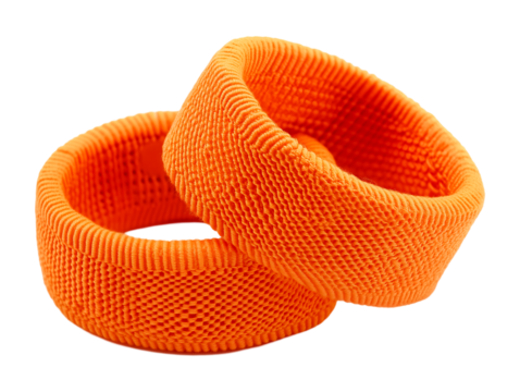 Pair of vibrant orange wristbands isolated on transparent background, PNG, cut out, capturing a clean and modern product shot that highlights the accessories design and color