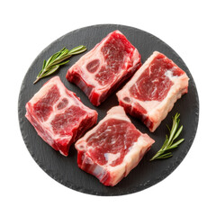 Raw beef ribs with rosemary seasoning on black plate, png,cutout