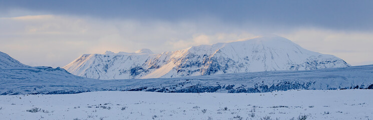 Winter landscape with snow covered mountains, Iceland