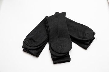 men's new black socks on white background