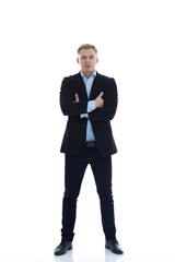 Obraz premium in full growth.a young man in a stylish business suit.