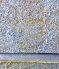 retro drawing of a face on a wall