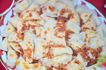 A national dish, dumplings. Festive presentation. National cuisine of the peoples of the South and the Caucasus
