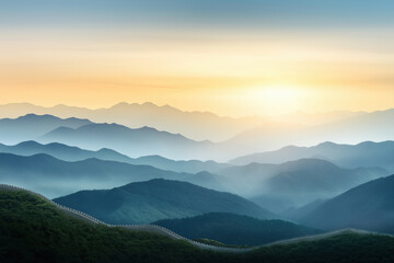 Breathtaking sunrise over the mountains with ancient wall winding through the landscape