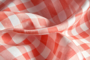 Close-up view of vibrant checkered textile showcasing intricate texture and pattern variation