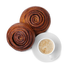 Delicious cinnamon rolls and cup of coffee isolated on white, top view