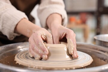 Hobby and craft. Woman making pottery indoors, closeup