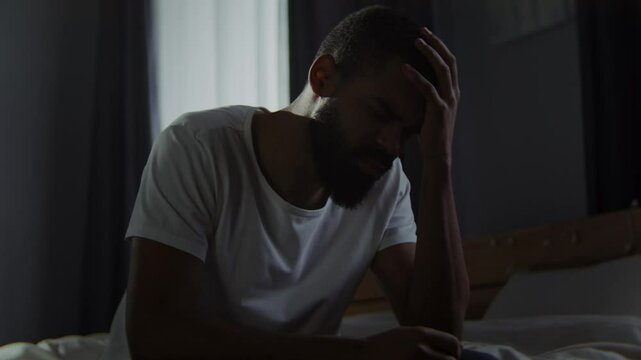 Hopeless African American man yells feeling strong stress