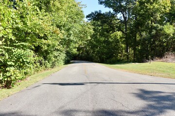 The empty street in the countryside on a sunny day.